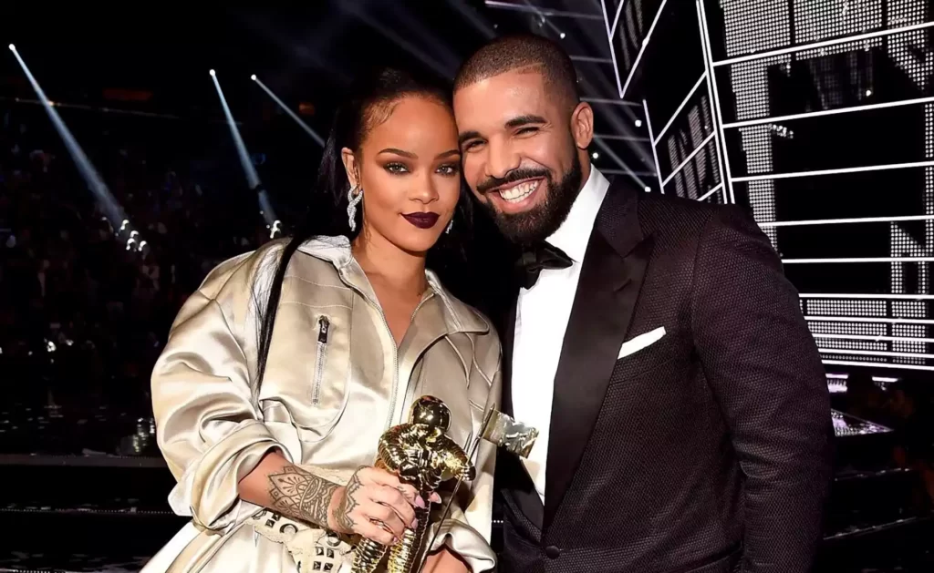 Singer Rihanna (L) and rapper Drake