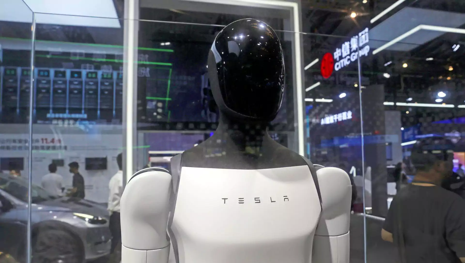 Tesla Debuts Optimus Humanoid Robot Elon Musk Claims It Will